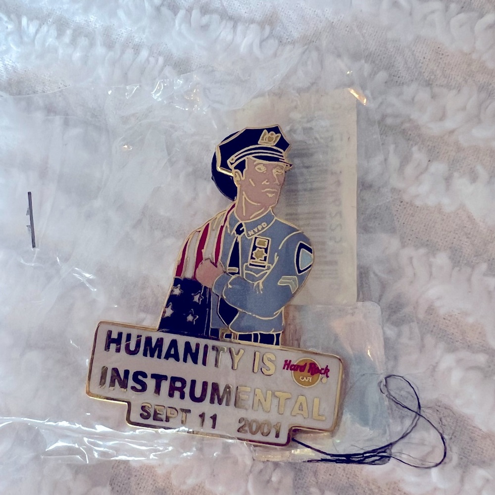 Hard Rock Cafe Humanity is Instrumental 9/11 September 11 2001 pin, mint